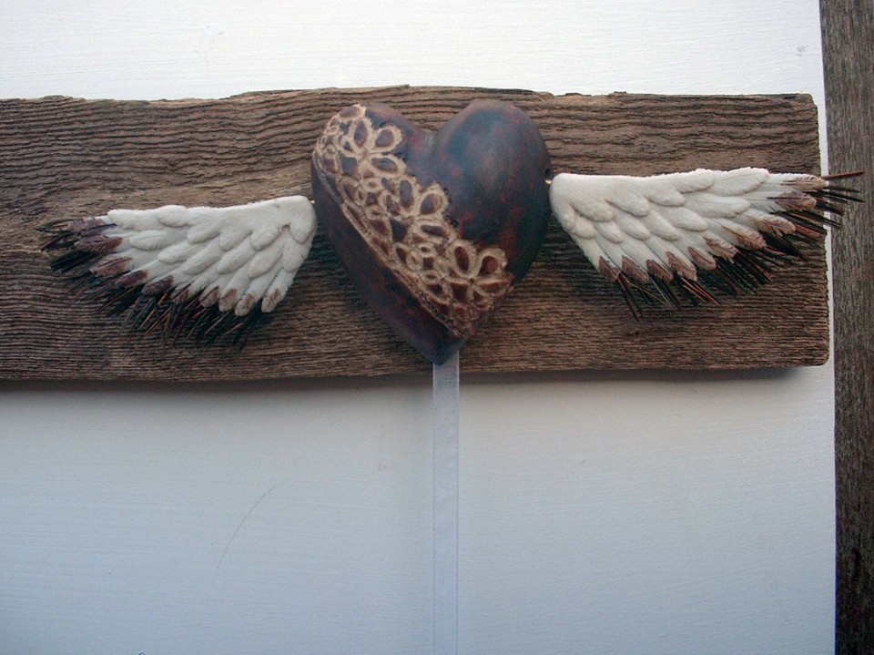 Flying heart ceramic detail