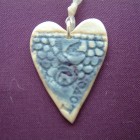 Heart pendant blue closeup