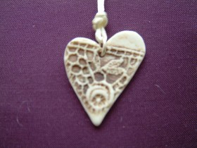 Heart pendant imprint detail