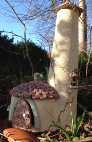 Round fairy house with a turret
