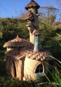Big fairy house with turret and chimney